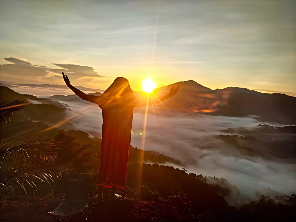 Watu Benta Flores camping trip with scenic landscape, cliffside tents, and vibrant sunset views in East Nusa Tenggara, Indonesia.