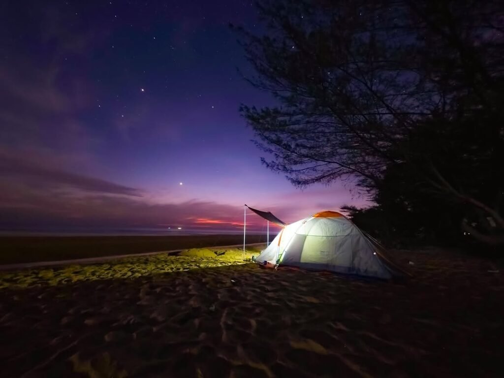 Camping trip in Riung with tents along the stunning beach