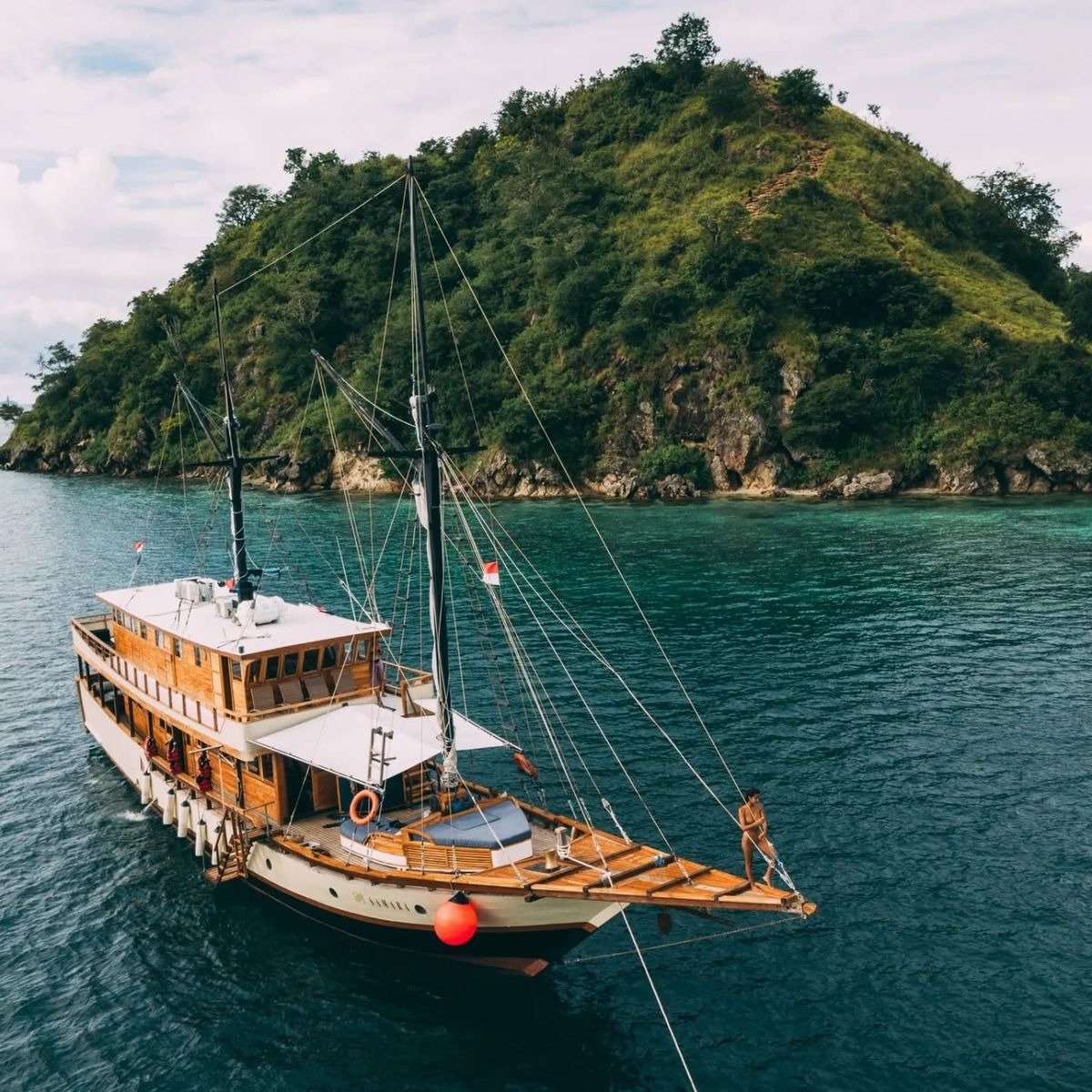 Komodo Private Tour exploring Komodo National Park with pink beach Komodo dragons and crystal clear snorkeling spots