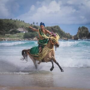 Local People Riding on the Boat-Sumba Tour Packages
