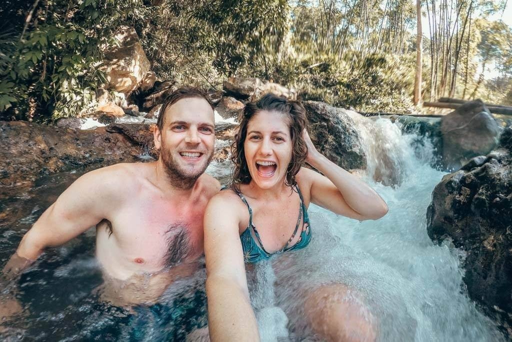 Malanage Flores natural hot springs with hot volcanic water flowing into a cool river near Bajawa
