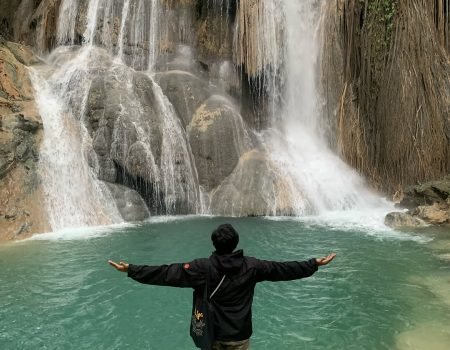 "Cunca Wulang Waterfall – A Hidden Gem of Flores, Indonesia with turquoise pools and jungle cliffs.