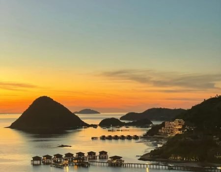 Stunning sunset over Labuan Bajo coastline, Flores, Indonesia.