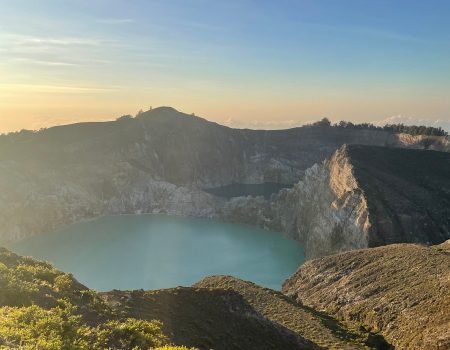 Exploring Kelimutu Volcano Lake Flores Indonesia, famous for its tri-colored crater lakes and volcanic landscape
